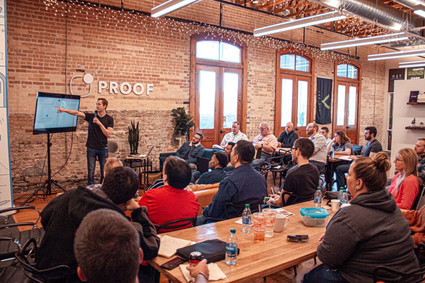 A creator teaching a room of members in a workshop